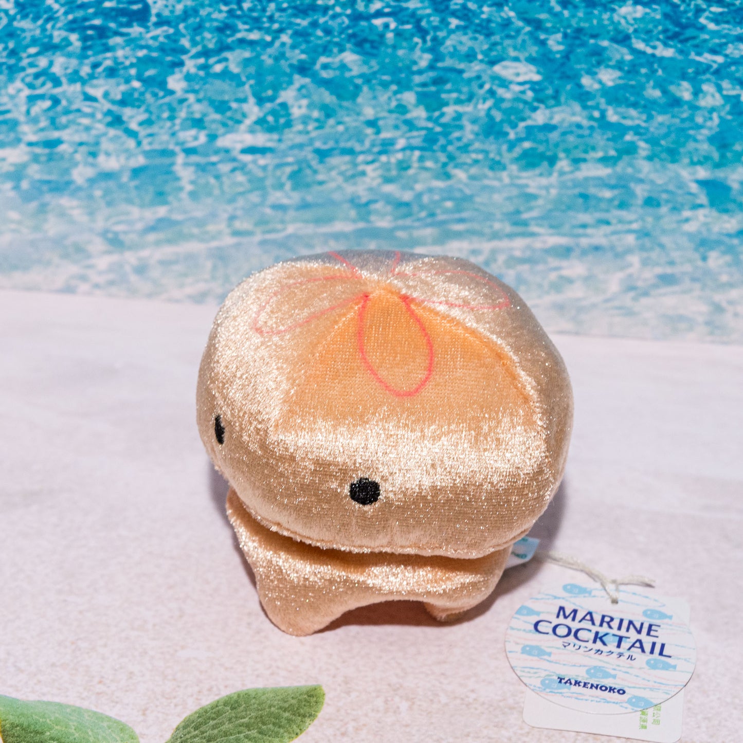 たけのこ TAKENOKO ぬいぐるみ パールクラゲ (押笛入) 薄オレンジ 80811 上面から