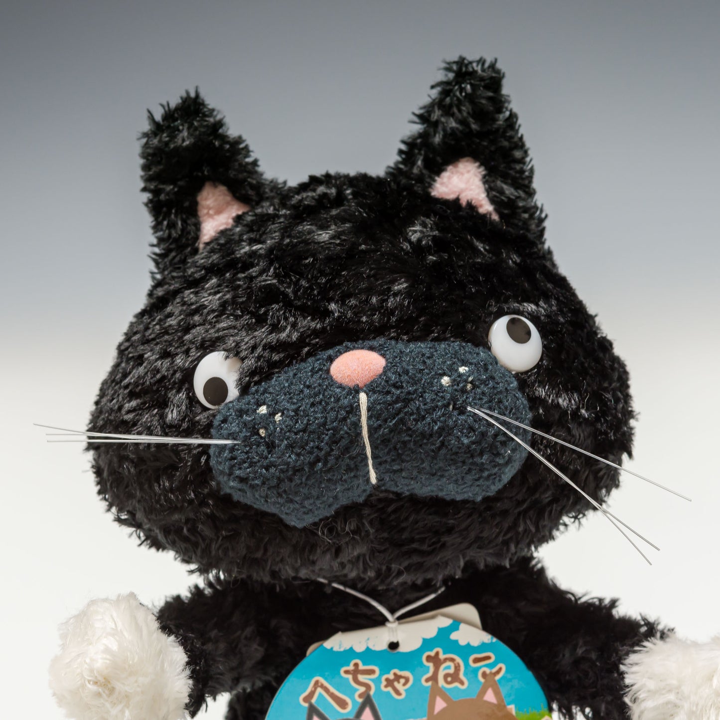 シナダ SHINADA ぬいぐるみ へちゃねこ くつした HCNK-0168 顔のアップ